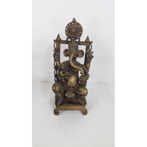 173 - A bronze Ganesha statue seated on a chair, 32cm h
Location: 3-1
If there is no condition report show... 