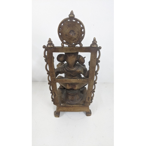 173 - A bronze Ganesha statue seated on a chair, 32cm h
Location: 3-1
If there is no condition report show... 