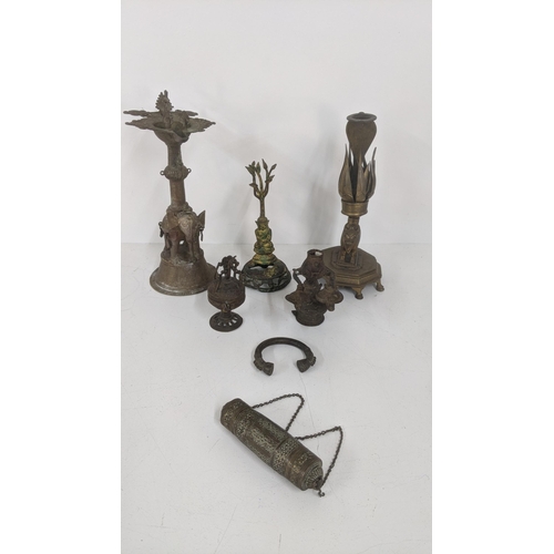 174 - Mixed Indian metalware interest to include a brass Dhokra work elephant oil lamp, an ash catcher inc... 