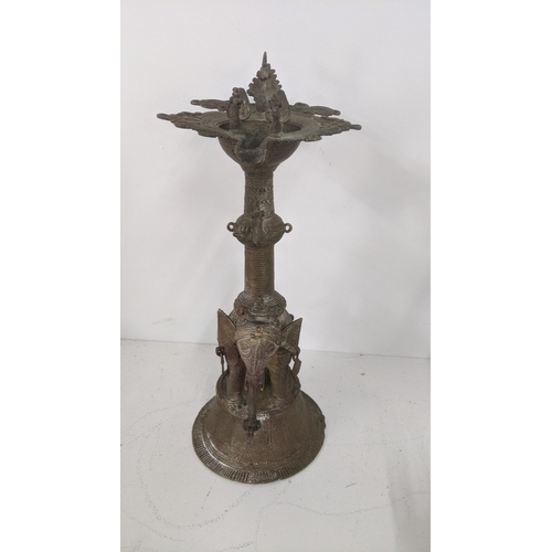 174 - Mixed Indian metalware interest to include a brass Dhokra work elephant oil lamp, an ash catcher inc... 