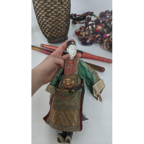 175 - A mixed lot to include a 20th century Indonesian Gourd scarecrow, together with a 1920's Chinese dol... 