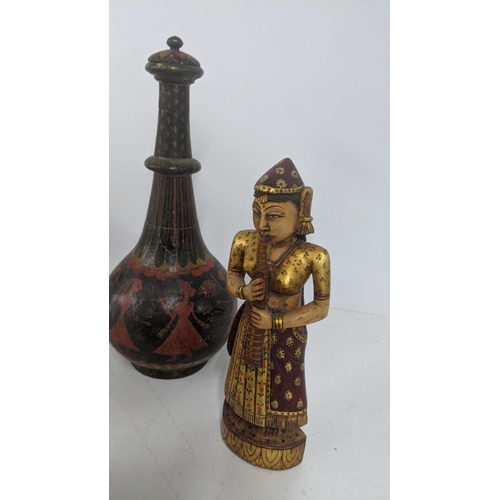 177 - A mixed lot of treen carved figures to include a gilt painted Buddha and others
Location:7.2
If ther... 