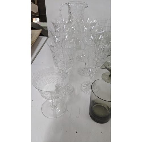 183 - Glassware to include a crystal cut water jug, a set of six matching Bohemian crystal red wine glasse... 