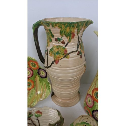 237 - Carlton ware to include an oak tree ribbed jug and others, together with Art Deco yellow floral jug,... 