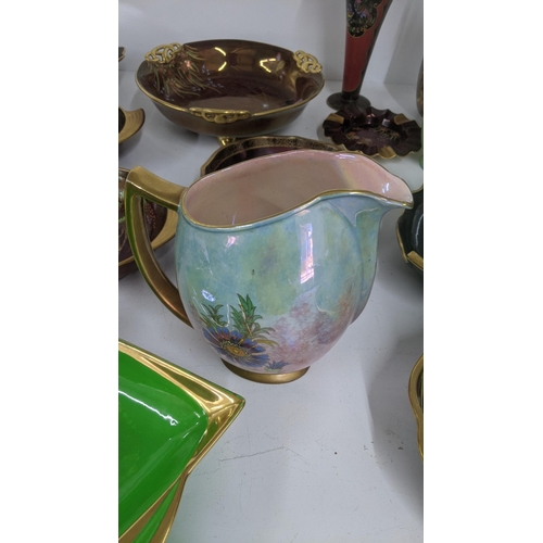 240 - Mixed Carlton ware to include a glazed jug with gilt handle, Rouge Royale and others Location:11.5
I... 