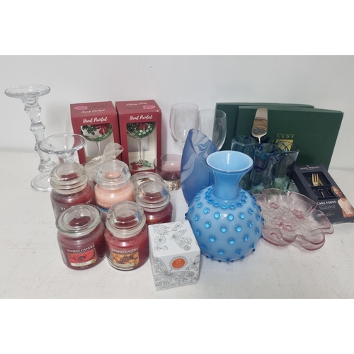 302 - A mixed lot to include a selection of Yankee Candles and others, glass candlesticks, an Italian mid-... 