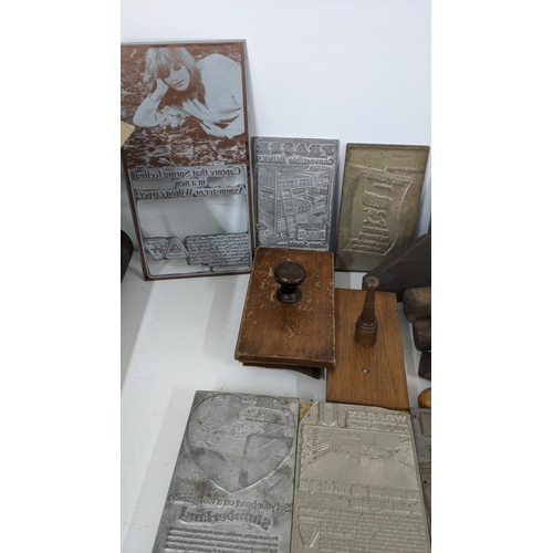 307 - A collection of 20th century and later printing plates and tools to include G-Plan furniture adverti... 