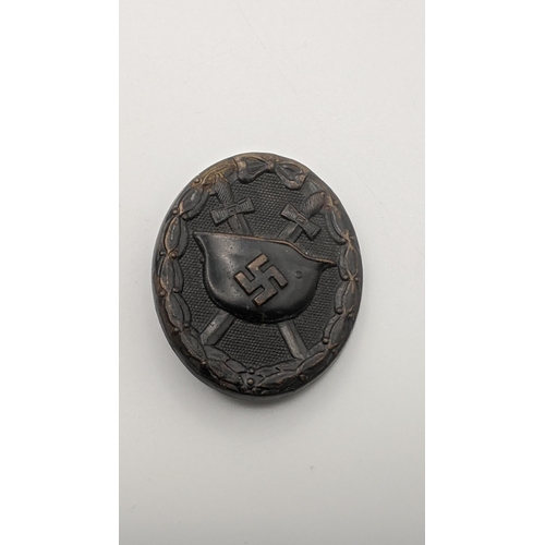 313 - A WW2 German Black Wound badge Location:CAB
If there is no condition report shown, please request