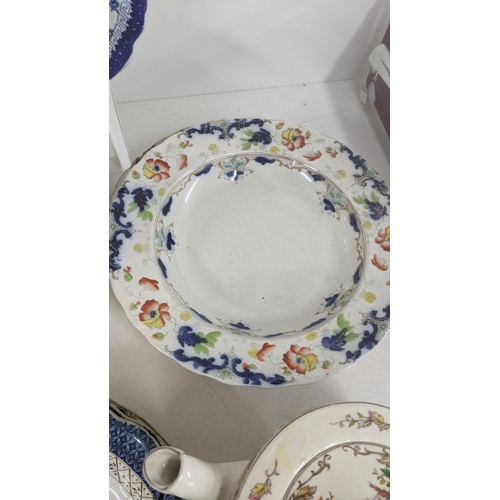 318 - Mixed ceramics to include a blue and white platter and plates, Royal Crown Derby and others Location... 