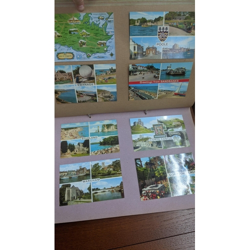 319 - Four postcard albums to include postcards from Snowdon, Thompson River and others Location:BWR
If th... 