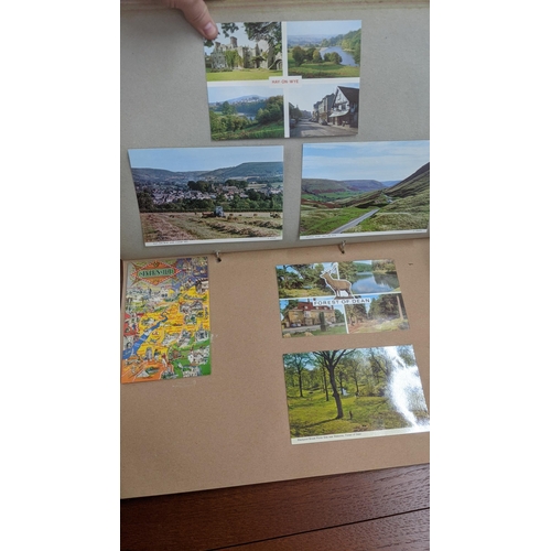 319 - Four postcard albums to include postcards from Snowdon, Thompson River and others Location:BWR
If th... 