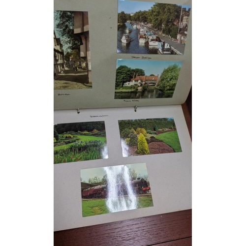 319 - Four postcard albums to include postcards from Snowdon, Thompson River and others Location:BWR
If th... 