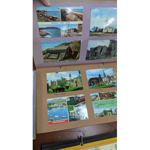 319 - Four postcard albums to include postcards from Snowdon, Thompson River and others Location:BWR
If th... 