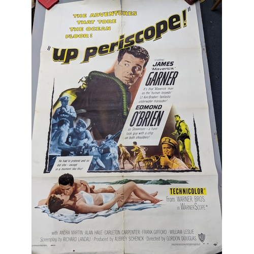 113 - A collection of mainly 1950s/60s and later movie posters unframed to include Robert Mitchum in Sheld... 