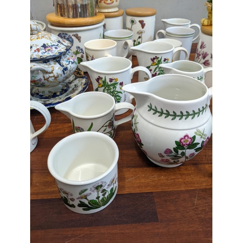 12 - Mixed china to include a commemorative ware, a part Portmerion dinner service and models of cats and... 