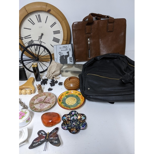 125 - A mixed lot to include wall clocks, Amazon Kindle, silver plated cigarette box, Zefer brown leather ... 