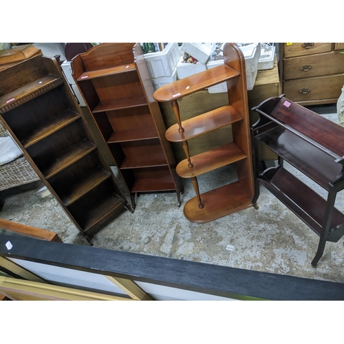 129 - A group of three Edwardian and later mahogany bookshelves, a five shelf oak open bookcase Location: ... 