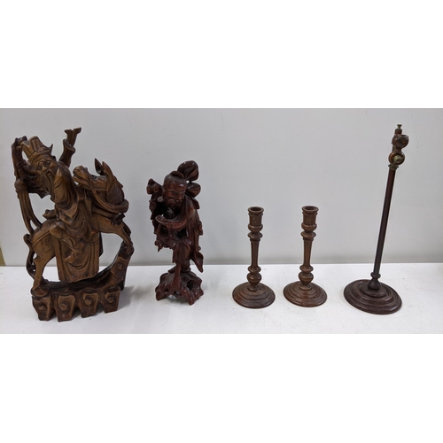 246 - Collectables to include three candlesticks and two oriental style carved murals
Location:11.1
if the... 