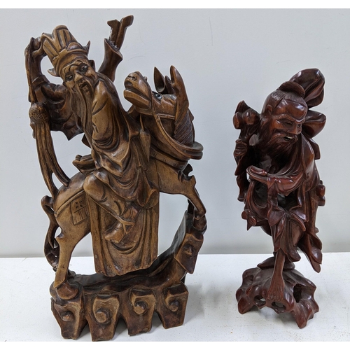 246 - Collectables to include three candlesticks and two oriental style carved murals
Location:11.1
if the... 