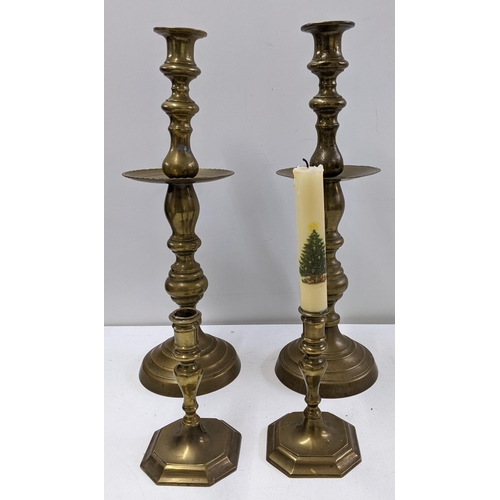 247 - Four brass candlesticks to include two Moroccan style and two vintage examples
Location:10.1
if ther... 