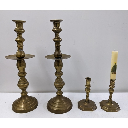 247 - Four brass candlesticks to include two Moroccan style and two vintage examples
Location:10.1
if ther... 