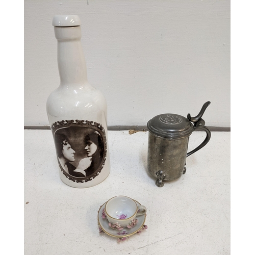 248 - Collectables to include a miniature Meissen cup and saucer, a pewter drinking flask, a Portmeirion p... 