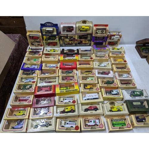 25 - A collection of approximately 69 Diecast vehicles, mostly Lledo 'Days Gone' examples and two boxed M... 