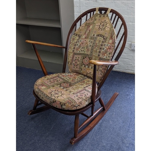 256 - An Ercol rocking chair and an Edwardian tub chair

Location:A2F
If there is no condition report show... 