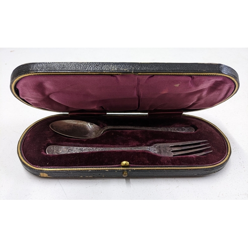 26 - A silver spoon and fork set hallmarked Sheffield 1904 James Lewis & Sons and an early 20th century p... 