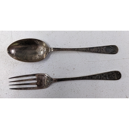 26 - A silver spoon and fork set hallmarked Sheffield 1904 James Lewis & Sons and an early 20th century p... 