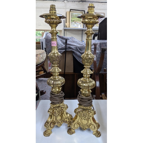 263 - Four brass gold effect table lamps, tallest 65cm h, shortest 50cm h, plugs removed
Location:A3F
If t... 