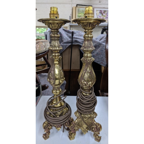 263 - Four brass gold effect table lamps, tallest 65cm h, shortest 50cm h, plugs removed
Location:A3F
If t... 