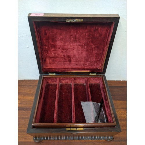 267 - An early Victorian lockable storage box with a removable tray and a hinged lid, with gold coloured s... 