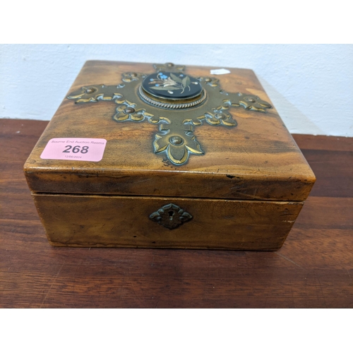 268 - A 19th century walnut Bezique games box with a key, with brass strapwork surmounting a Pietra Dura p... 