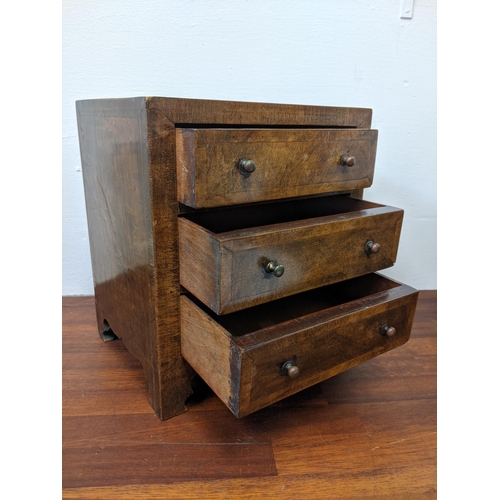 269 - An apprentice walnut three drawer dressing chest, metal knobs, raised on bracket feet, 20cm d x 25cm... 