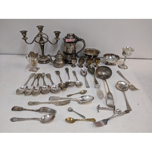 271 - Silver plate to include an 18th/19th century tankard, flatware and other items Location:A3M
If there... 