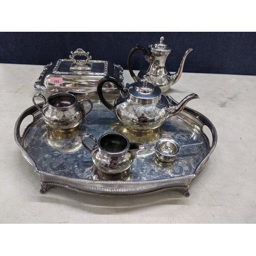 285 - Silver and silver plate to include a coffee pot, teapot lidded tureen, a large tray a silver tea str... 