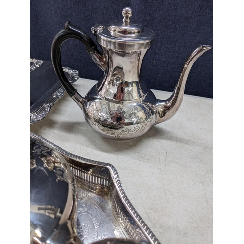 285 - Silver and silver plate to include a coffee pot, teapot lidded tureen, a large tray a silver tea str... 