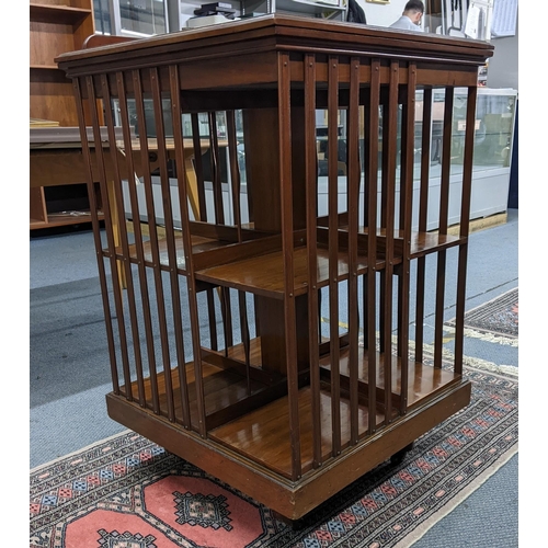 294 - An Early 20th century walnut two tier revolving bookcase with a galleried back
Location:A2M
If there... 