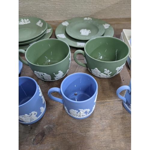 31 - Wedgwood Jasper stoneware to include cup, saucers, and plates, a vase and other items
Location: LAB
... 