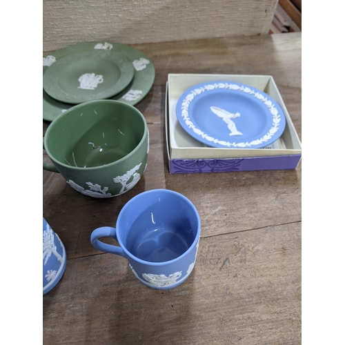 31 - Wedgwood Jasper stoneware to include cup, saucers, and plates, a vase and other items
Location: LAB
... 