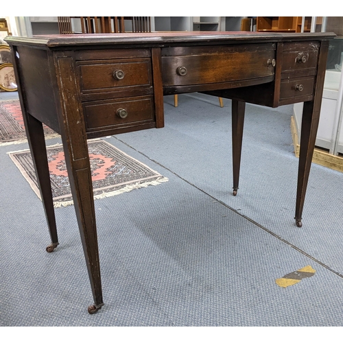 315 - An Edwardian mahogany desk with five drawers and wheeled feet
Location:BWR
If there is no condition ... 