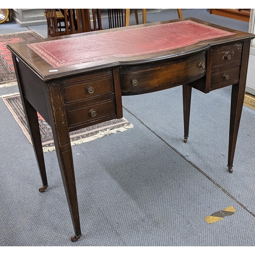 315 - An Edwardian mahogany desk with five drawers and wheeled feet
Location:BWR
If there is no condition ... 