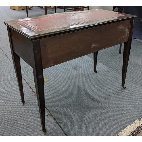 315 - An Edwardian mahogany desk with five drawers and wheeled feet
Location:BWR
If there is no condition ... 