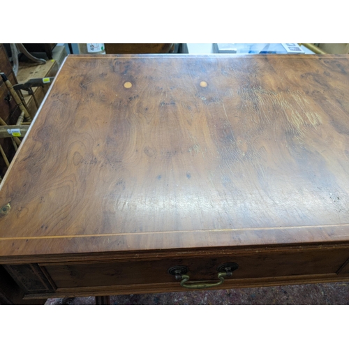 33 - A late 20th century yew sofa table with drawers, on splayed legs
Location: BWR
If there is no condit... 