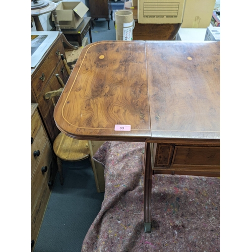 33 - A late 20th century yew sofa table with drawers, on splayed legs
Location: BWR
If there is no condit... 