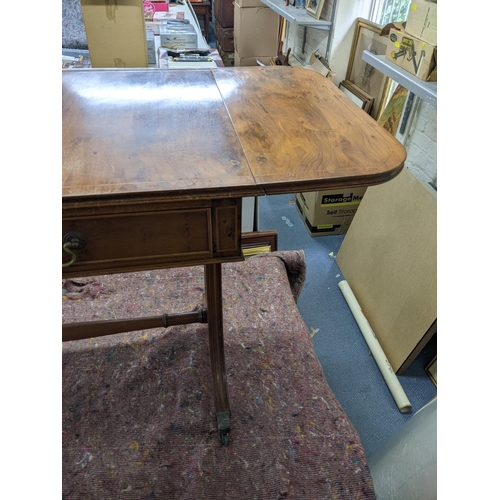 33 - A late 20th century yew sofa table with drawers, on splayed legs
Location: BWR
If there is no condit... 