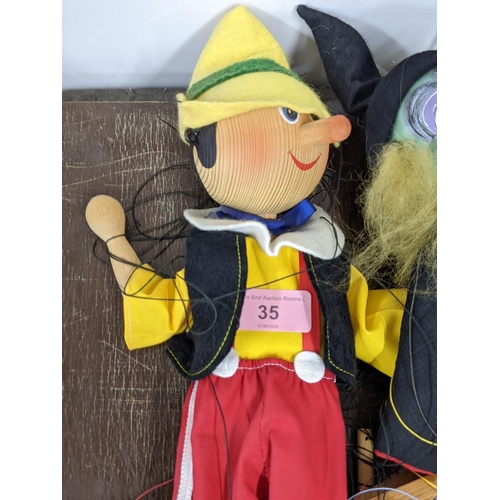 35 - A witch Pelham puppet, a modern wooden puppet and a Classic figure Dick Turpin
Location: 1-3
If ther... 