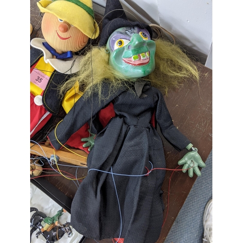 35 - A witch Pelham puppet, a modern wooden puppet and a Classic figure Dick Turpin
Location: 1-3
If ther... 