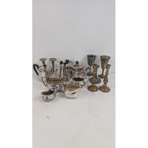 373 - Mixed metalware to include silver plated items, two teapots, sugar bowls, cream jug and others along... 